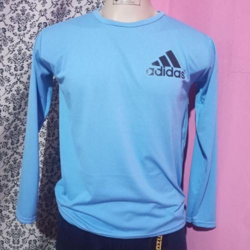 Camisa deportiva manga larga celeste