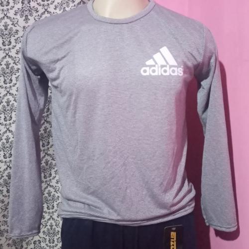 Camisa deportiva manga larga gris claro