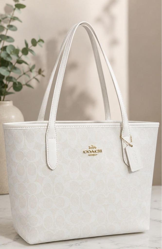 Bolso coach grande