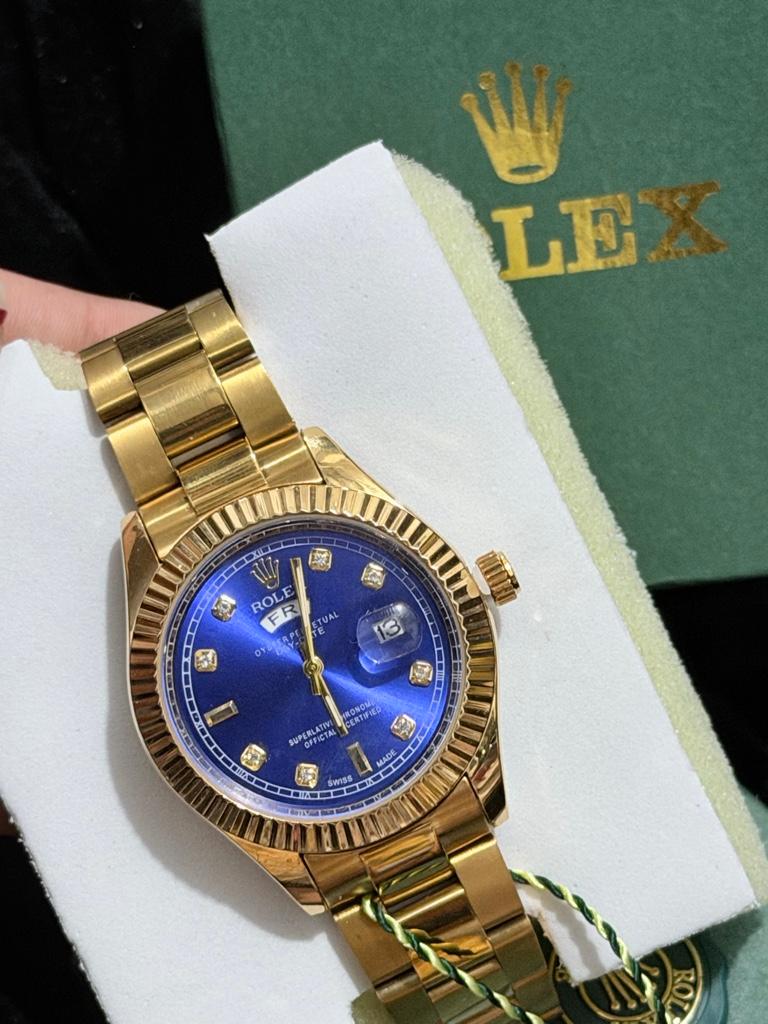 Rolex dorado azul