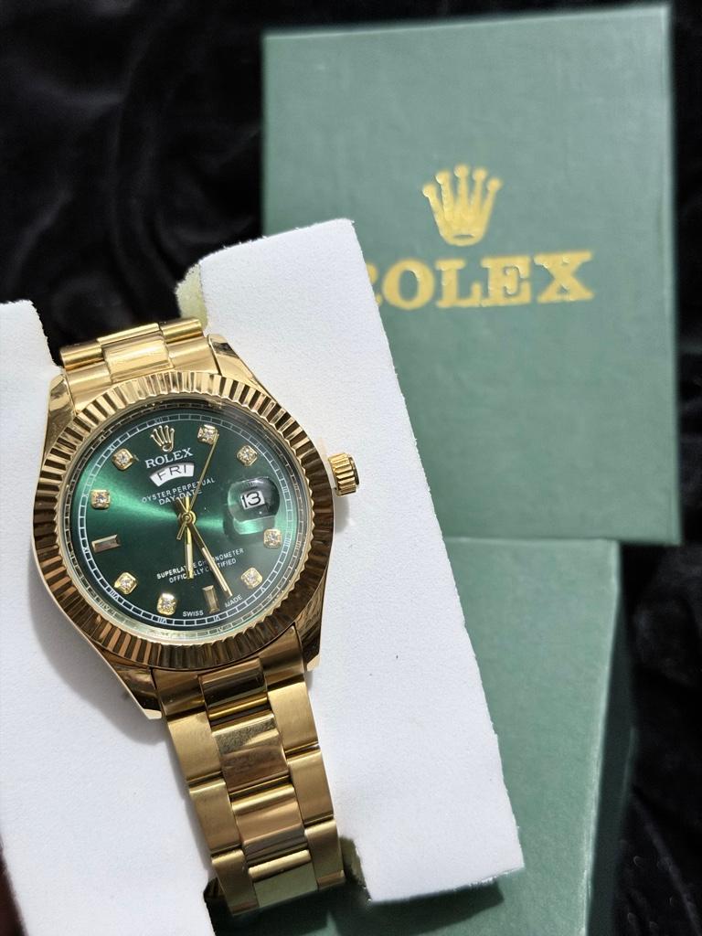 Rolex dorado verde