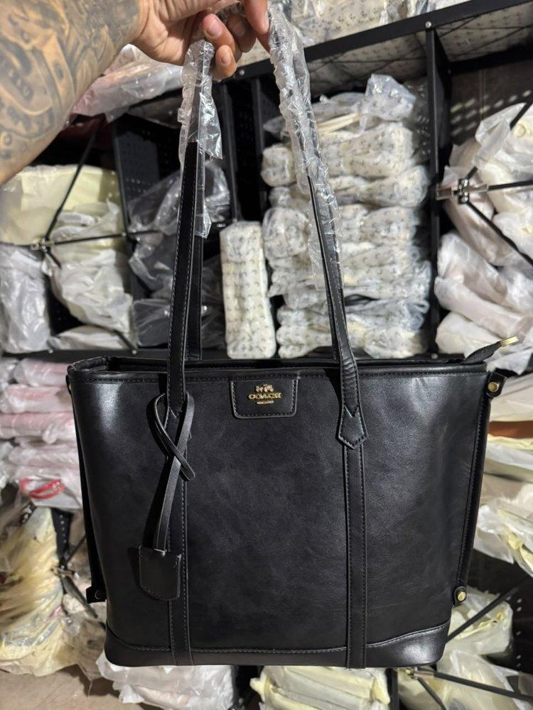 10088 Cartera Coach negra