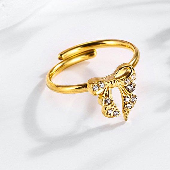 Anillo dorado de acero lazo