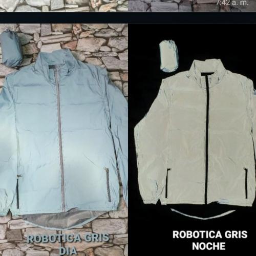 Chaqueta Reflectiva.De día gris metalizado,de noche reflectiva totalmente