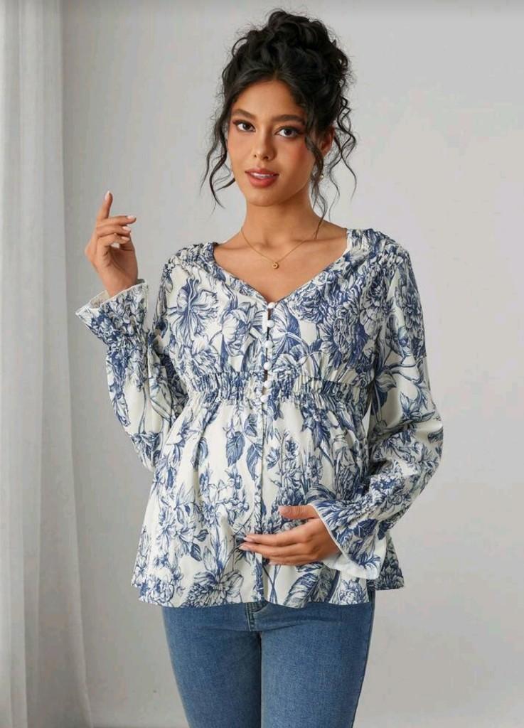 Blusa manga larga estampada en azul