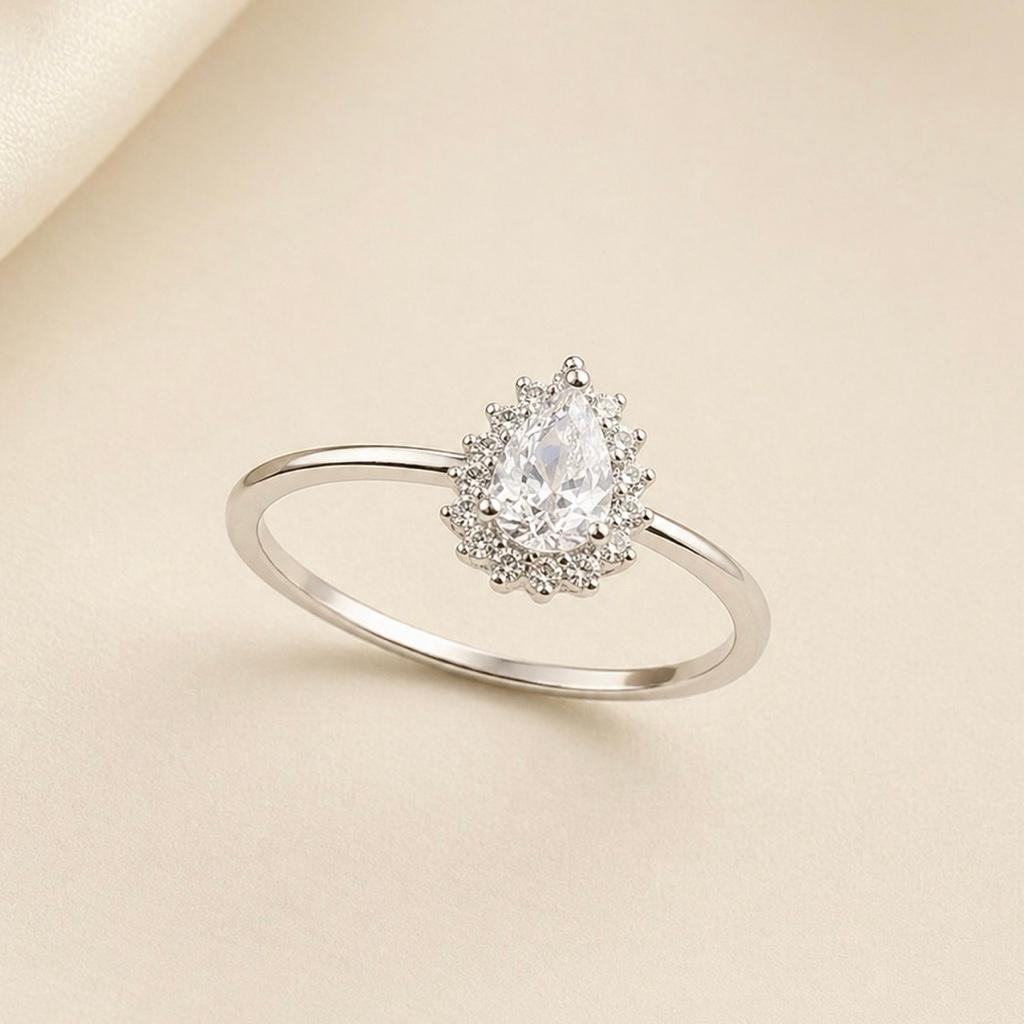 Anel gota c/ ponto de luz - cristal