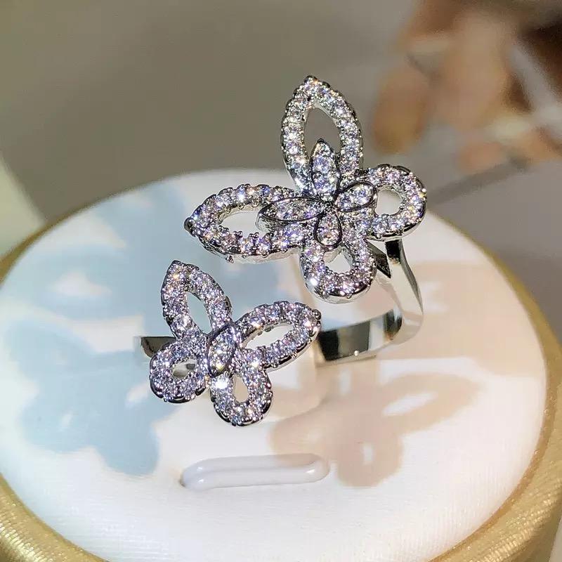 Anillo abierto mariposas en micro circonias en plata