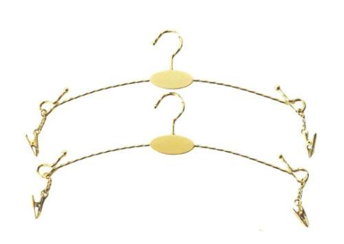 Ganchos de metal con pinzas delicado