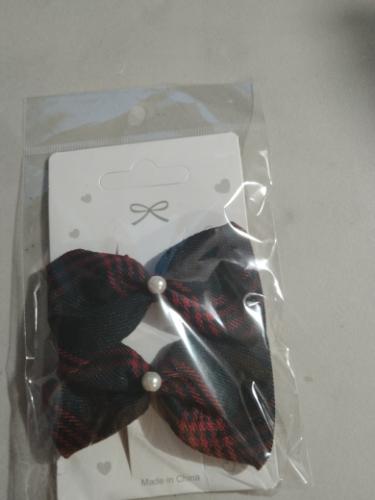 2 moños extra pequeños de broche