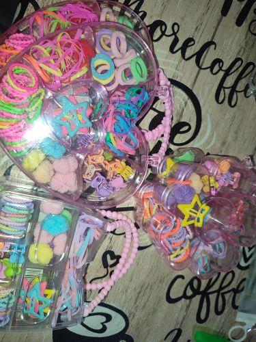 Accesorios de nena colitas de nena en cartera.