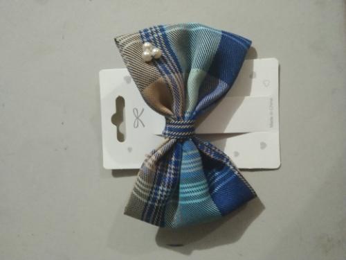 Miniatura 3 de 1 moño mediano de broche