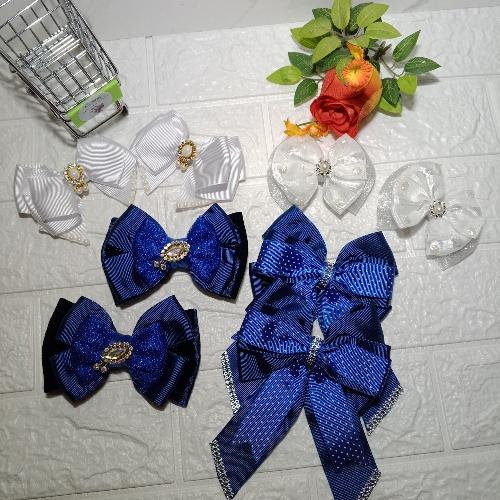 Dos pares lazos azules y un par blanco