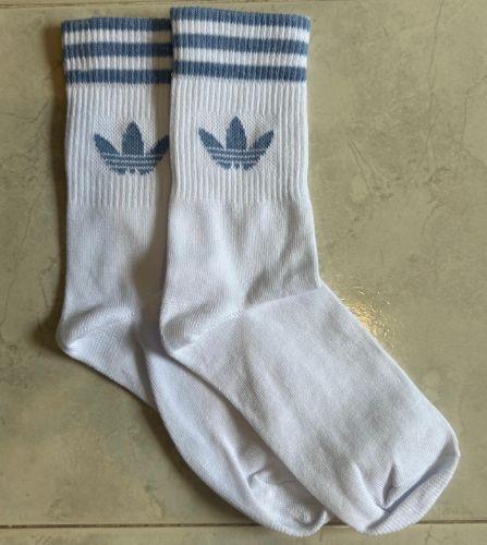 Adidas blancas con celeste 3/4