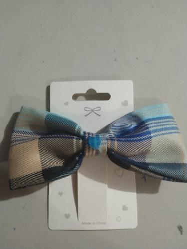 Miniatura 2 de 1 moño mediano de broche