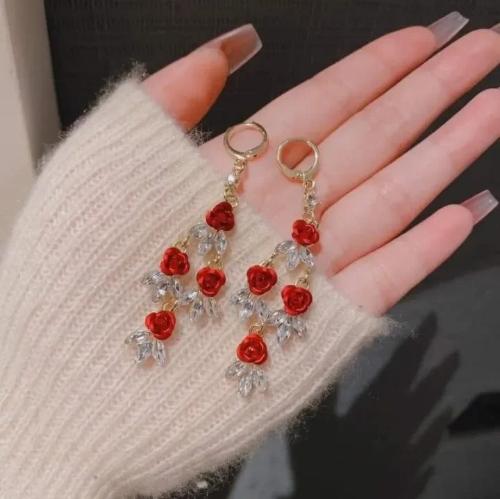 Aretes corenos🇰🇷💗 largos de rosas.
