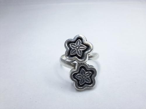Anillo doble de flores ( regulable) 