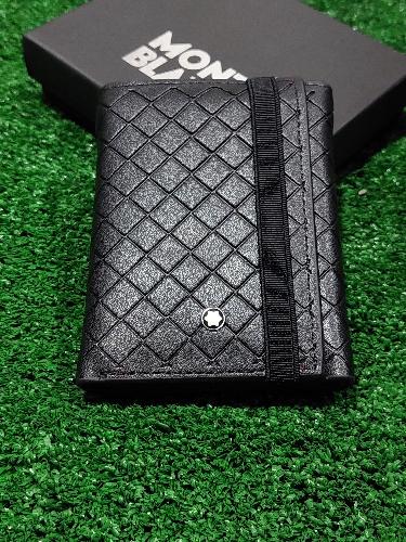 Cartera momblck exagonales 