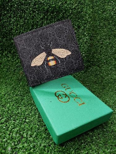 Cartera mosca negra