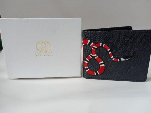 Cartera negra borda