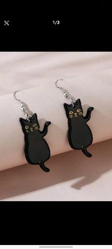 Aretes de gato negro