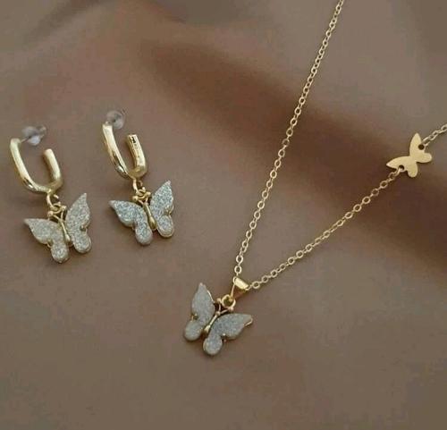 Conjunto mariposa plateada