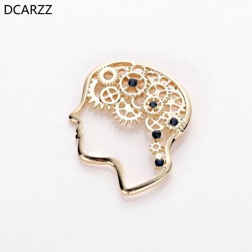 Broche de mecanismo humano dorado