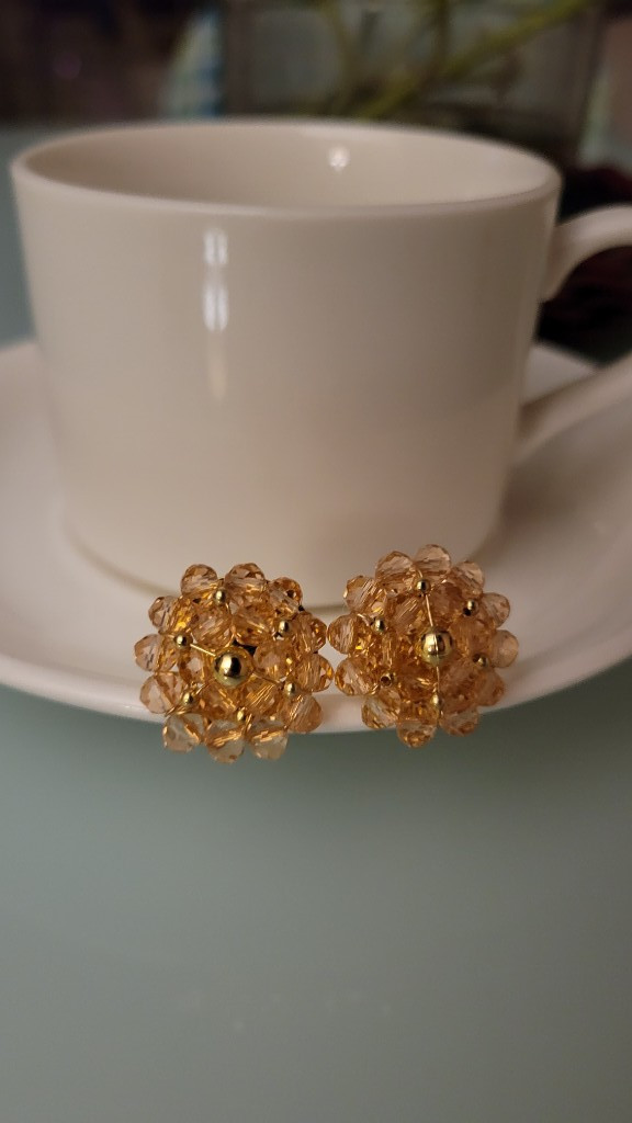 Imagen 1 de Aretes doble Flor Nudo de Oro