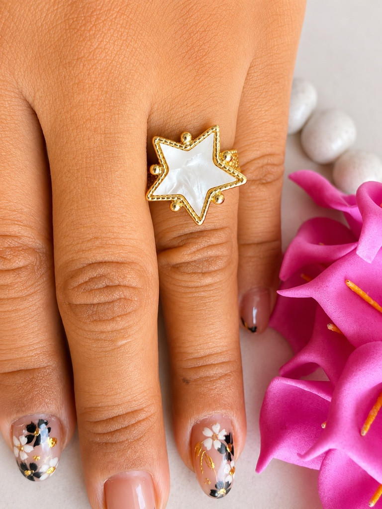 Imagen 1 de Anillo estrella nacar dorado