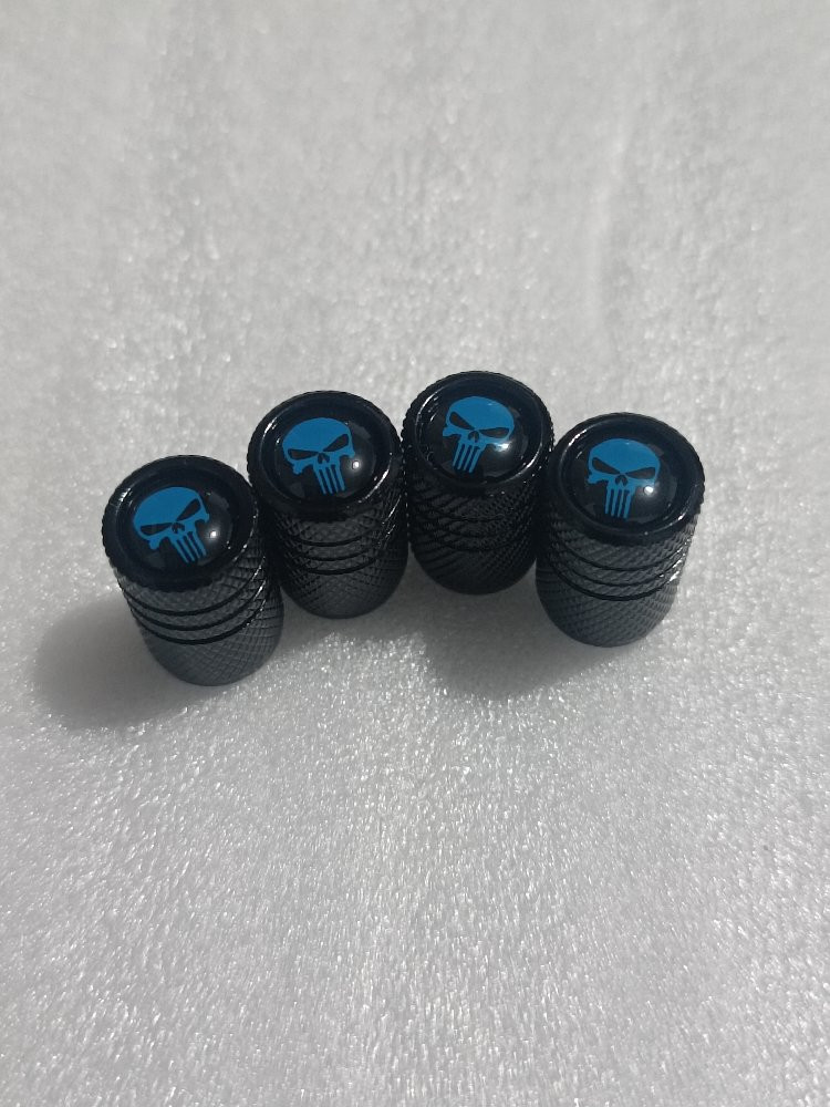 Imagen 1 de JUEGO DE 4 TAPA VALVULAS CALAVERA NEGRA / AZUL