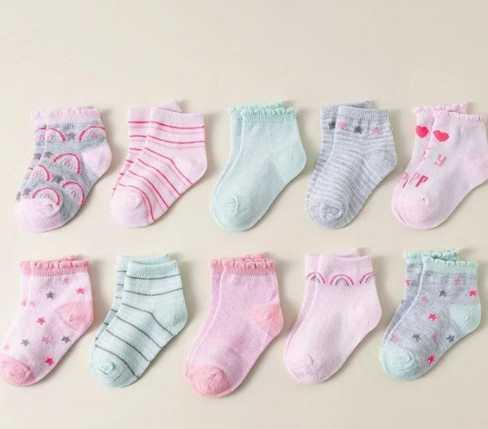 Imagen 1 de 2 Par de medias de niña colores pasteles y figuras arcoiris 1-3T