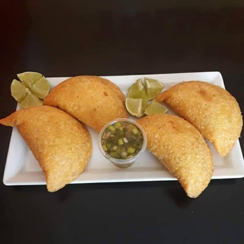 Imagen 1 de 1A) Empanadas de Lechona.