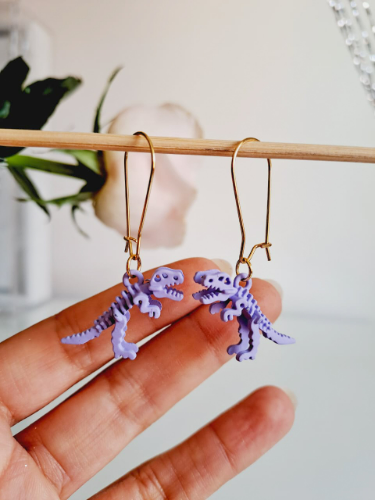Imagen 1 de Aretes Dinosaurio Lila
