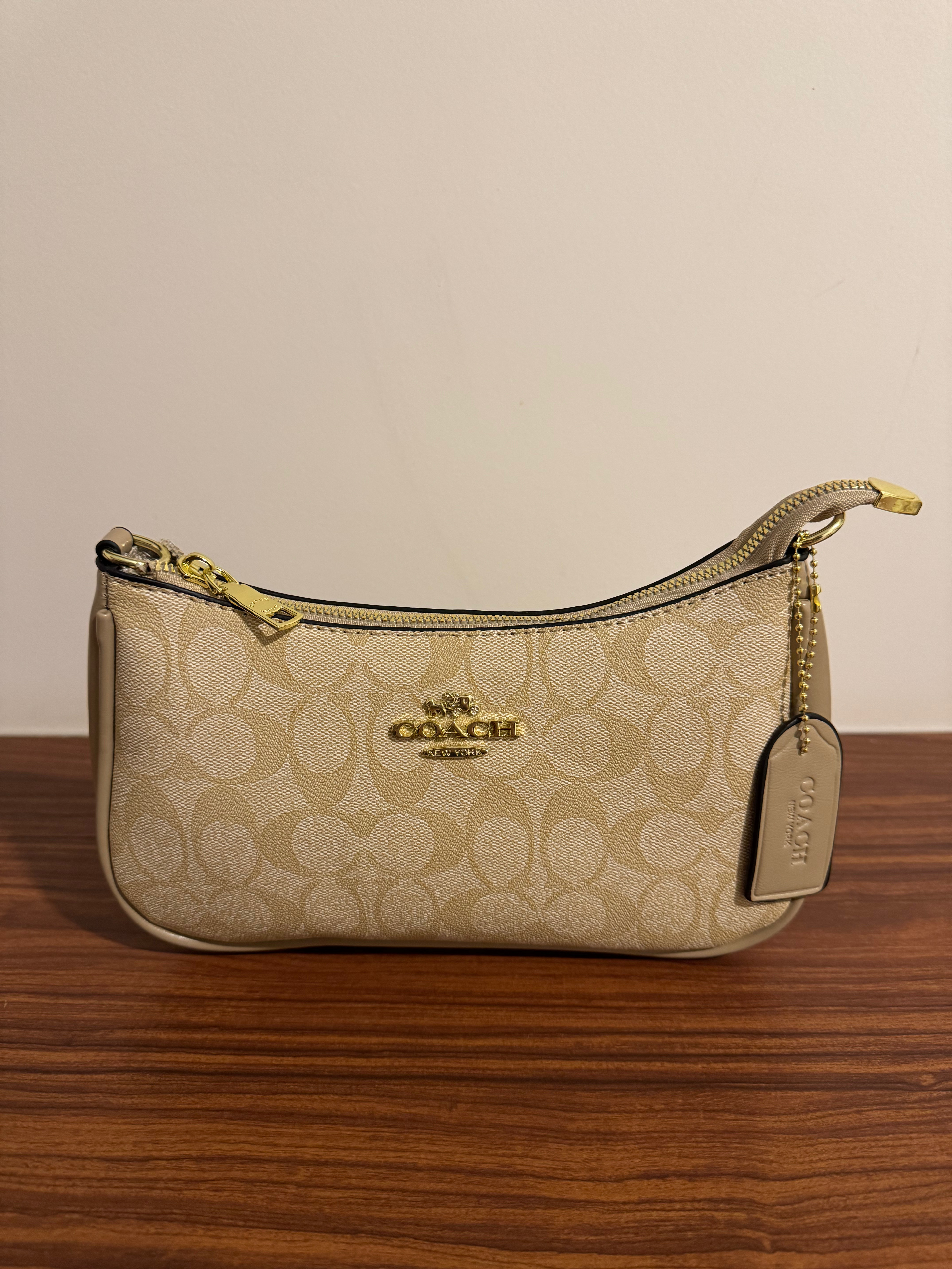 Imagen 1 de Coach Nolita 19 – Signature Canvas (Caqui)
