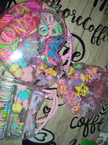 Imagen 1 de Accesorios de nena colitas de nena en cartera.