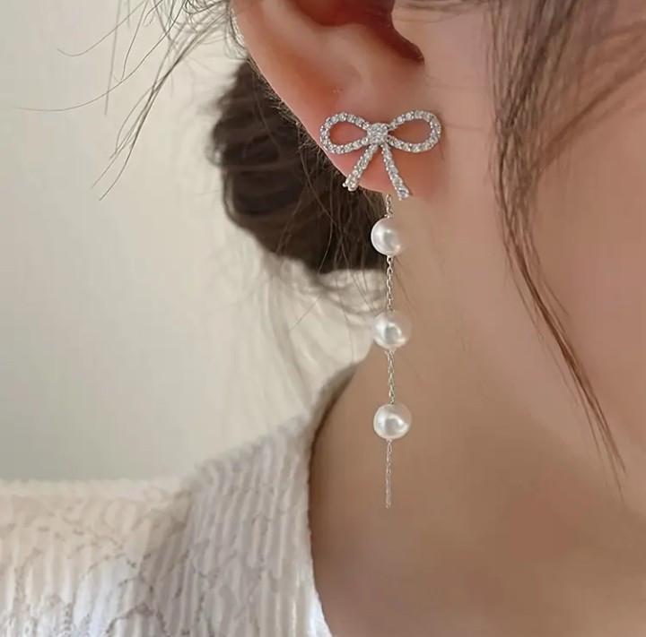Imagen 1 de Aretes Blancos Perlas con Moño