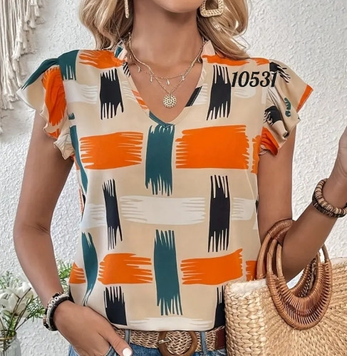 Imagen 1 de Blusa beige naranja, talla L