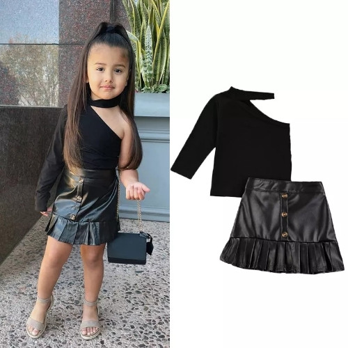 Imagen 1 de  blusa 1 manga +falda leather 