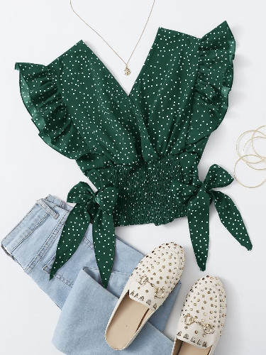 Imagen 1 de Blusa bruncida abajo con estampado de lunares