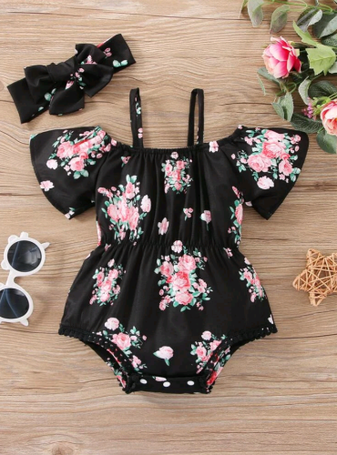 Imagen 1 de Body negro con estampado de flores rosadas. 