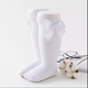 Calcetines lisos de lazo blancos