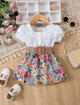 BB2-Top blanco con falda floreada y fajita talla 18-24m