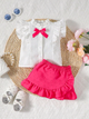 BB2-Blusa blanca falda fucsia talla 12-18m (Reventa)