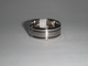ANILLO DE ACERO ARO DE MATRIMONIO LISO CON 2 CANALES FINOS EN LOS BORDES 7.5X1MM ANA000117