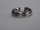 ANILLO EN ACERO ARO DE MATRIONIO LISO 2 CANALES CRUZADOS 5.5X1.5MM ANA000138