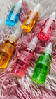 FIJADOR DE MAQUILLAJE EN SPRAY DE COCO NARANJA ROSAS Y ALOE SURTIDOS HUXIABEAUTY REF F311