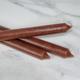 VELAS LARGAS MARRONES X UNIDAD