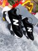 NEW BALANCE NEGRO BLANCO OXFORD