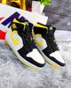 JORDAN R1 NEGRO BLANCO AMARILLO