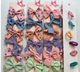 Colita moño cinta grande x 6