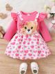 BB2-Mameluco rosado osito falda de tirantes talla 9-12m